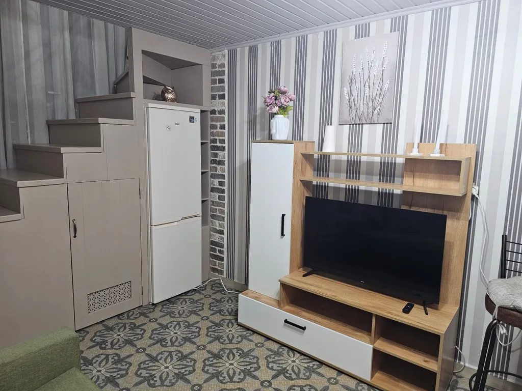 Квартира Двухэтажные апартаменты с дизайнерским ремонтом — Москва