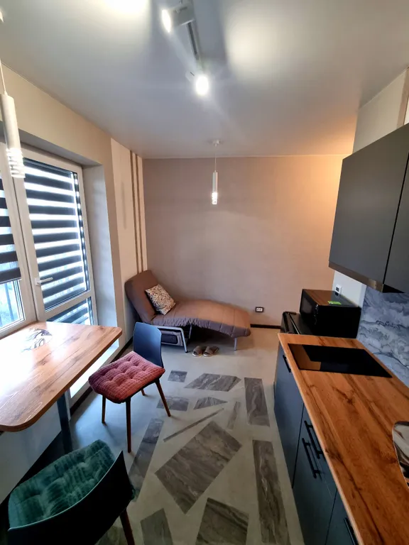 Уютная студия в сердце города на 13 этаже с панорамным видом