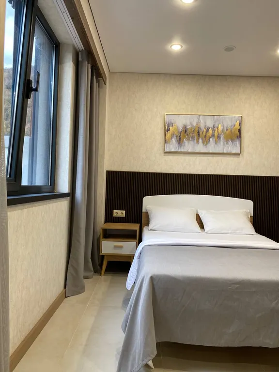 Апартаменты с собственной парковкой вблизи подъемника Горная Карусель