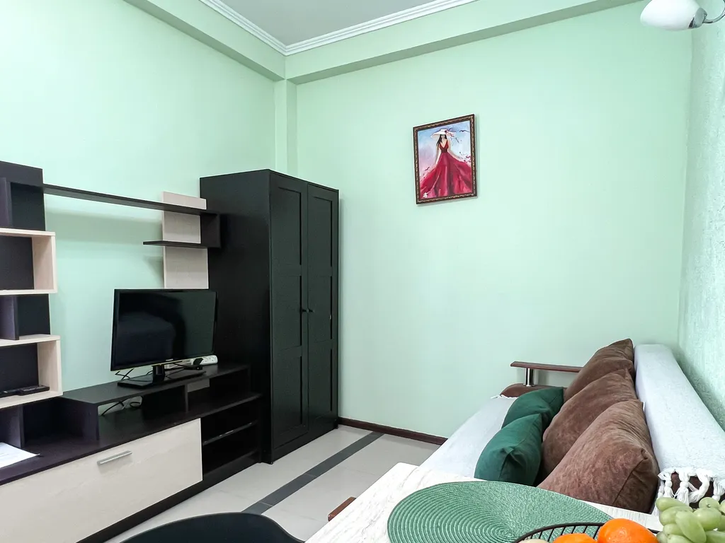 Семейный номер с кухней в центре