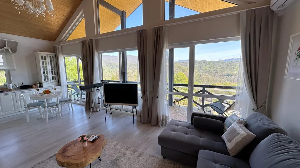 Дом в стиле шале с панорамный видом на горы