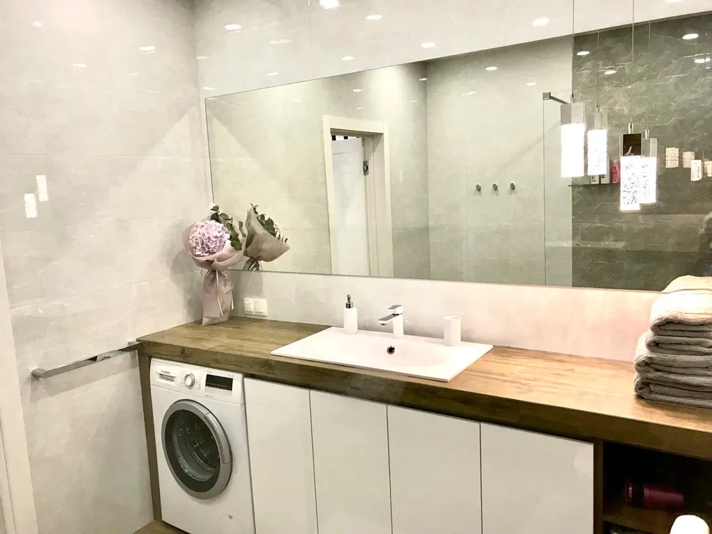 Новая квартира с подземным паркингом в центре