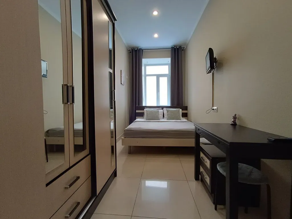 Комнаты с двуспальной кроватью, общими санузлами и кухней