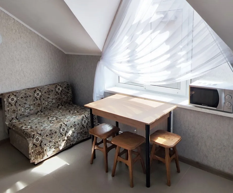 Апартаменты с 1 спальней на мансардном этаже гостевого дома Регион 86