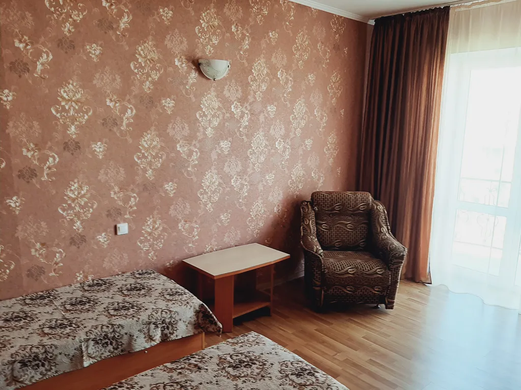 Уютные номер в доме для проживания гостей