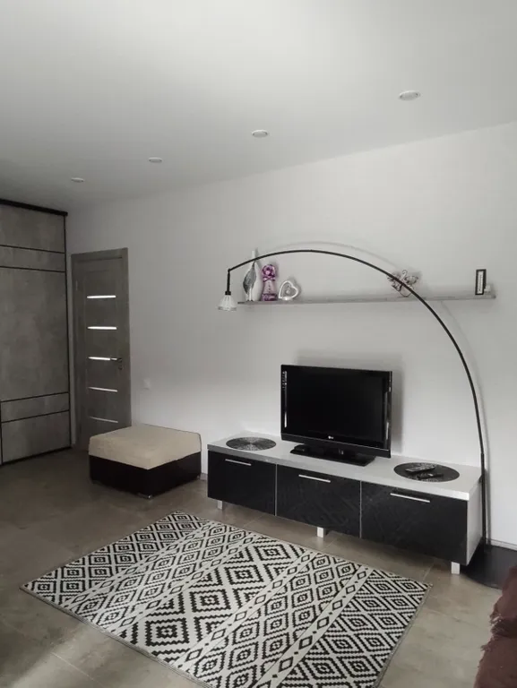 Уютный дом в черте города для комфортного отдыха в лесной местности