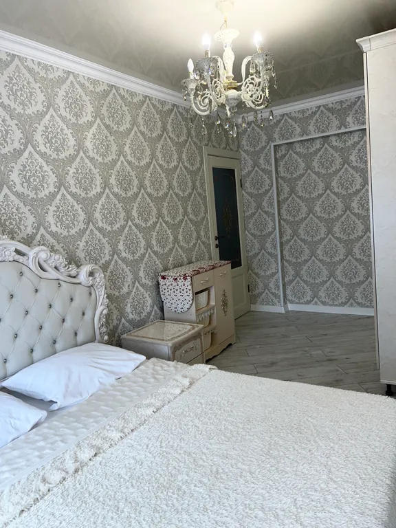 Апартамент с видом на море и на колесо обозрения