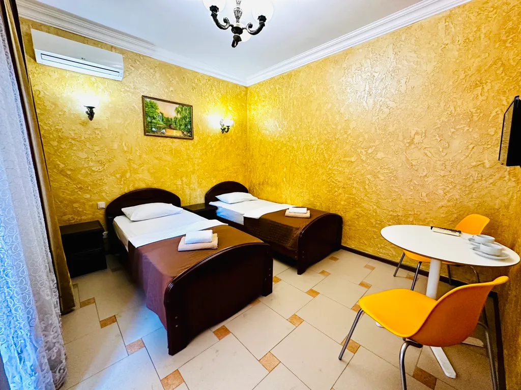 Квартира Квартира Уютные номера на 1 этаже в гостевом доме Эльбрус на 1 линии в Адлере — Адлер