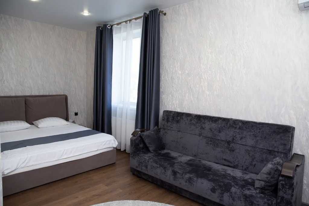 Квартира Четырехместный номер с 1 кроватью и диваном — аренда посуточно в Уссурийск