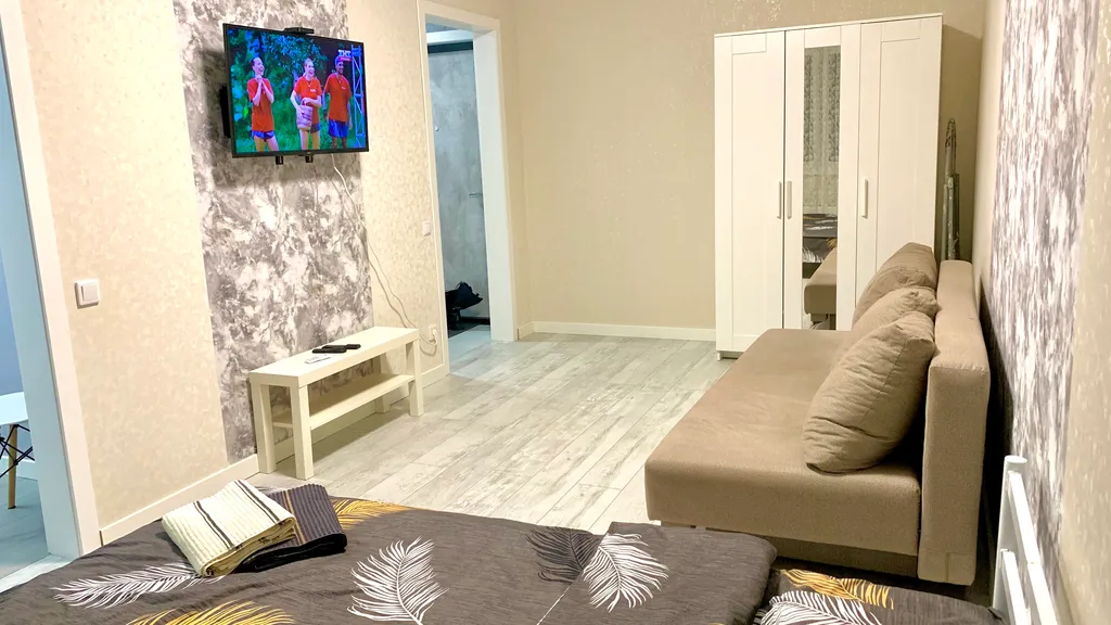 Современная квартира в новом жилом комплексе рядом с въездом в город