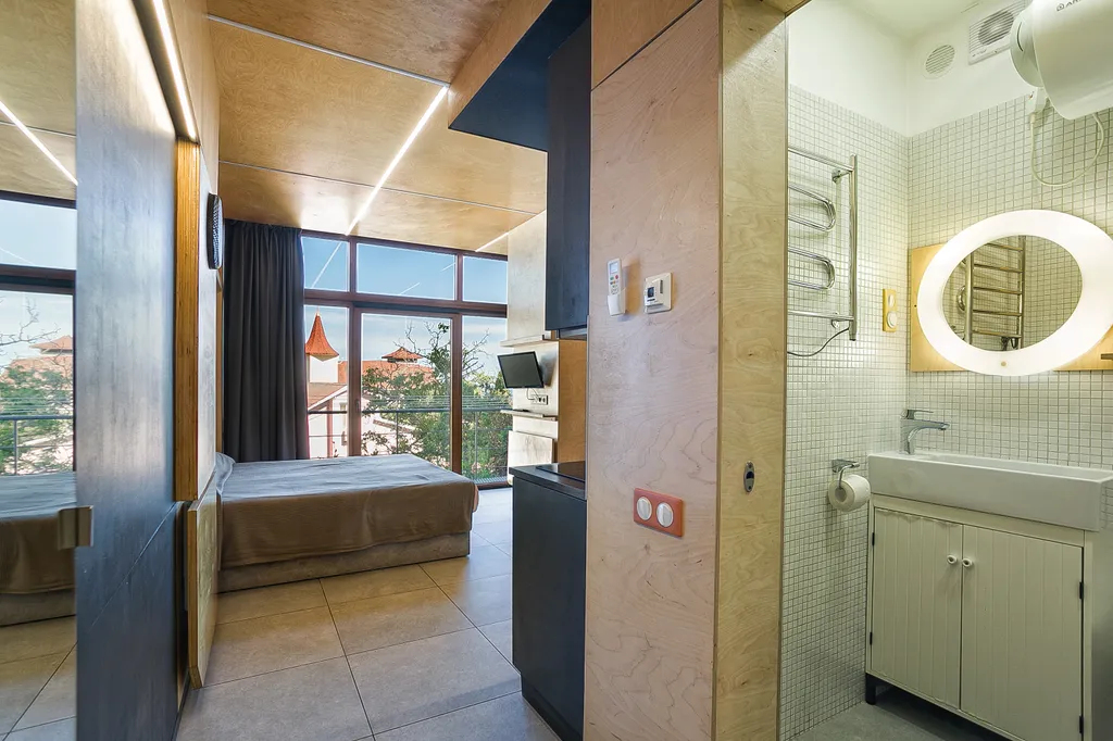 Современная квартира-студия под горой Кошка