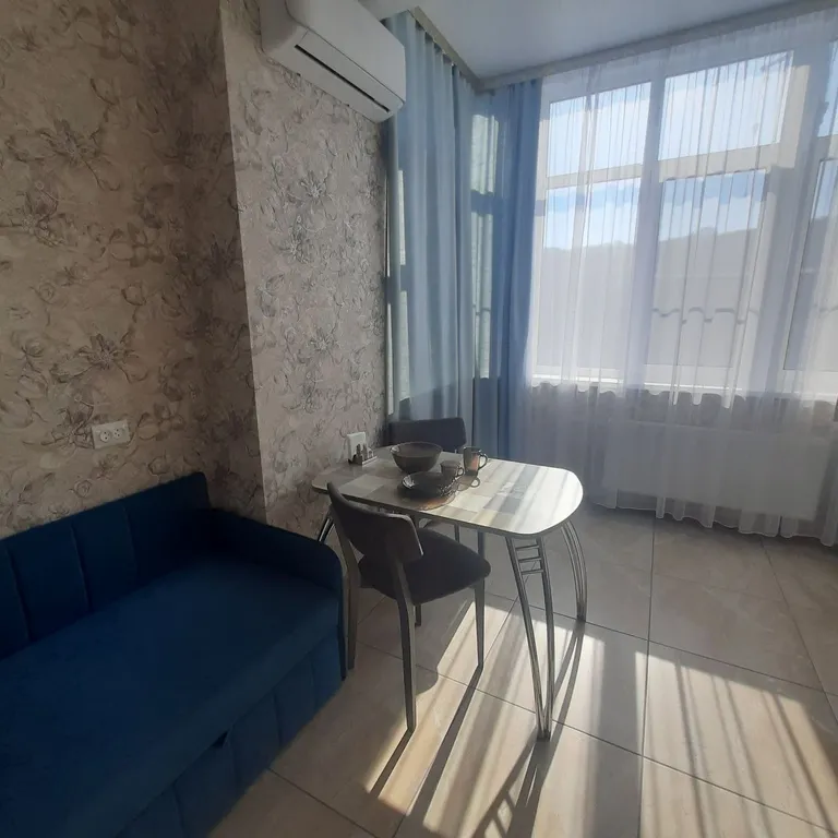 Уютная однокомнатная квартира в новом доме с видом на горы