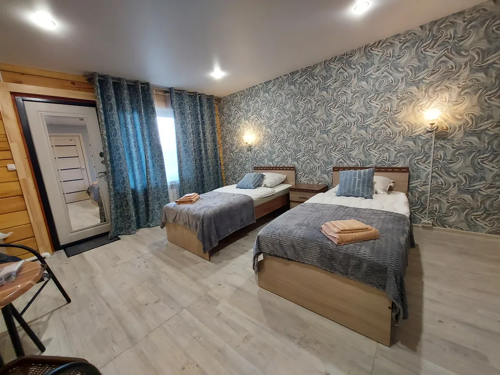 Двухместный номер с 2 раздельными или 1 большой кроватью