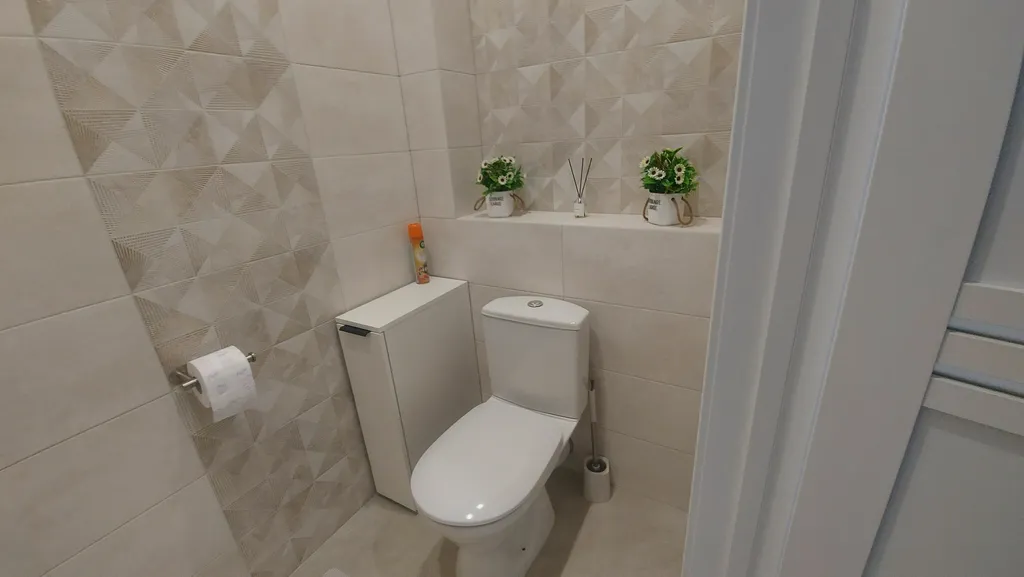 Квартира с видом на город и рощу