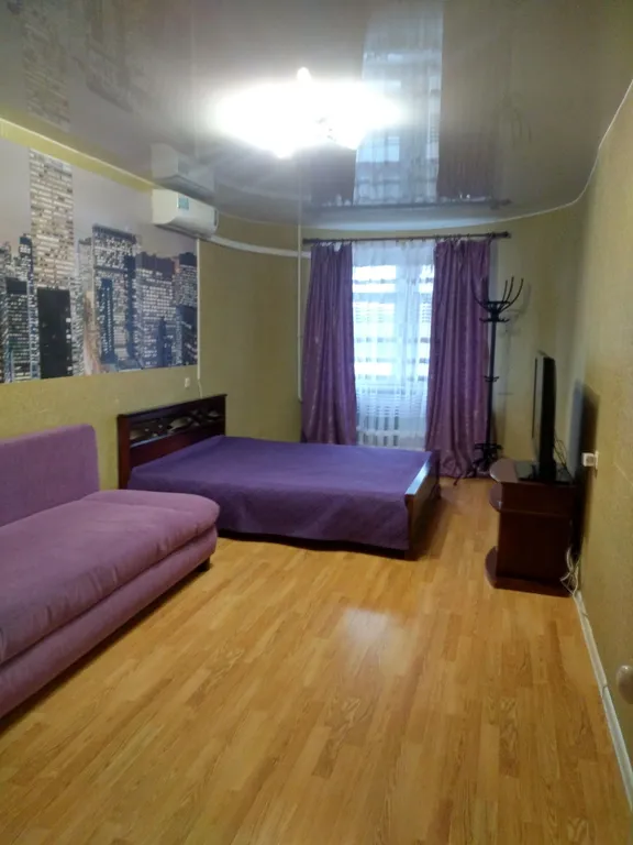 Уютная квартира в географическом центре города с кондиционером.