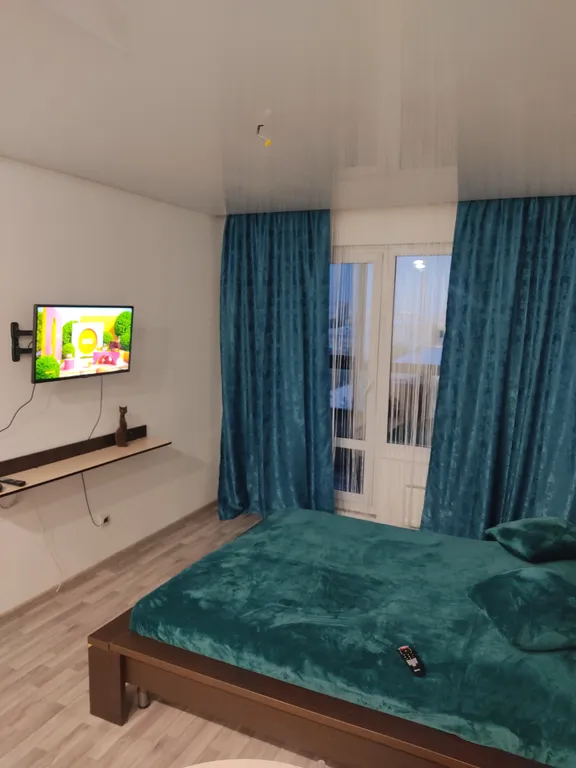 Уютная студия с видом на город