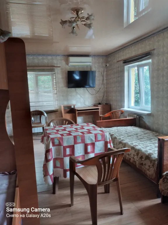 Дом у моря с площадкой в саду