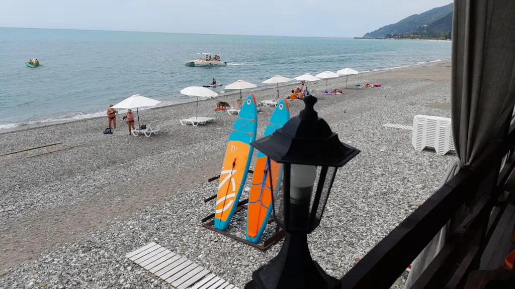 2х местный номер делюкс с кроватью king size, балконом и видом на горы