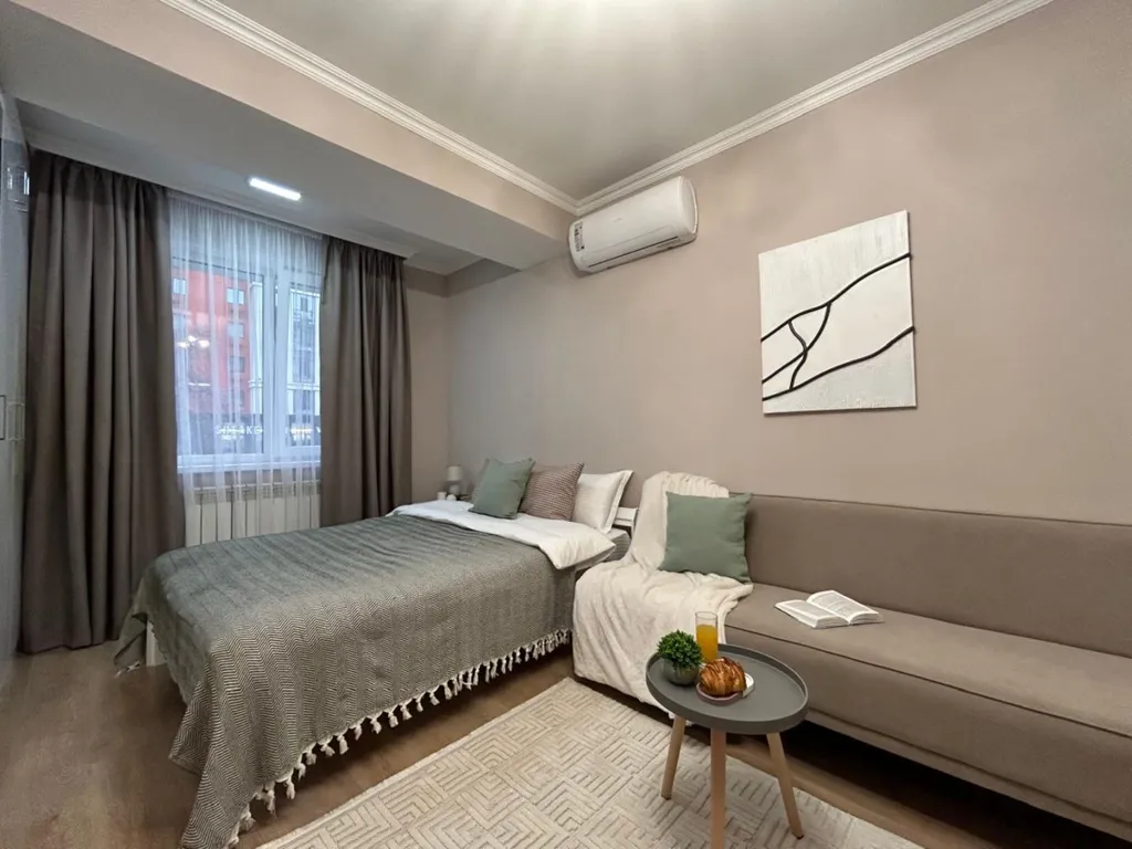 Нежная и уютная студия Кашемир в сердце города