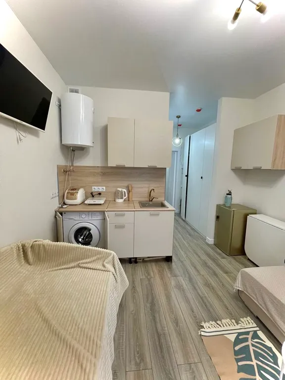 Уютная студия с видом на бассейн