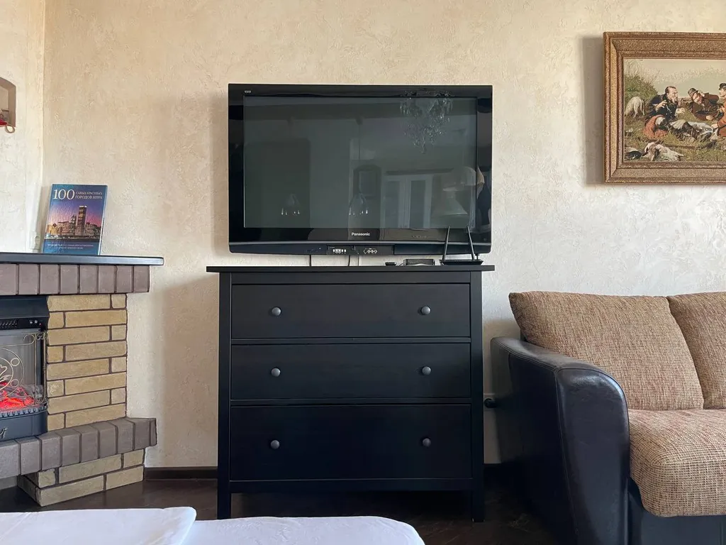 Стильная квартира с камином в центре города