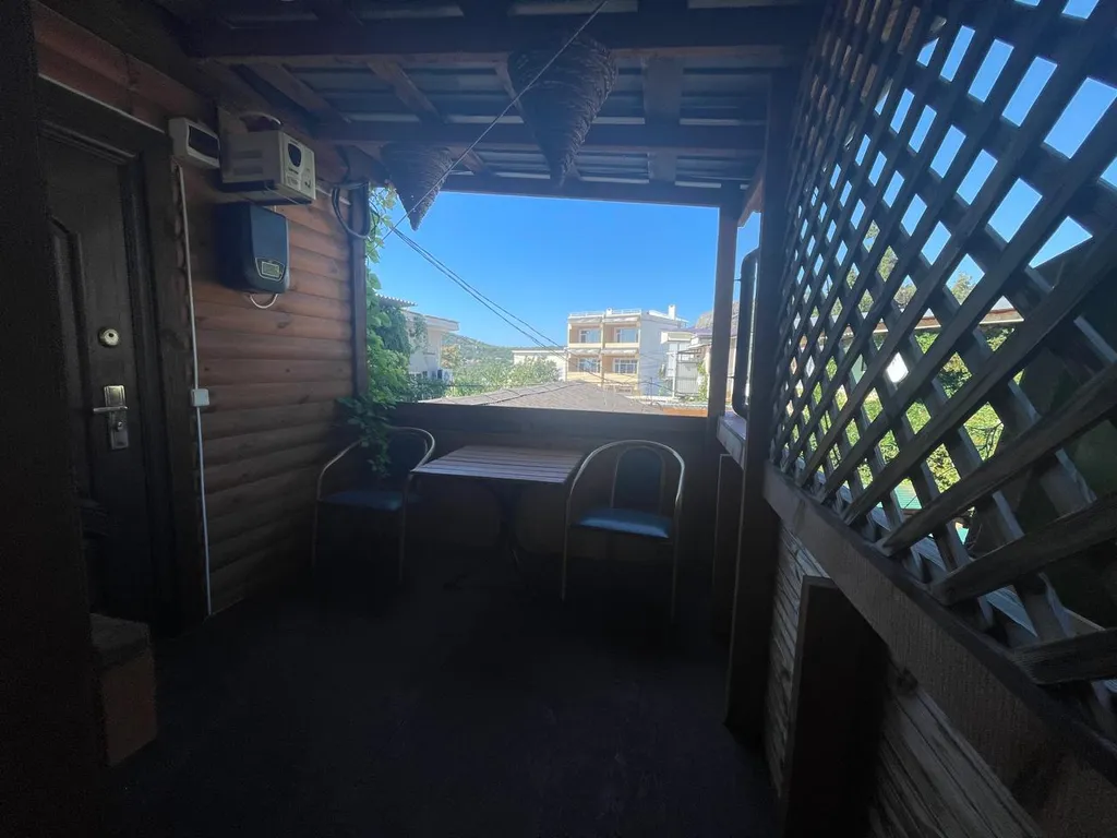 Двухэтажный коттедж с можжевеловым садом