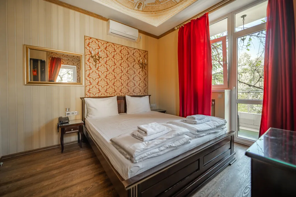 Двухместная комната с двуспальной кроватью НР