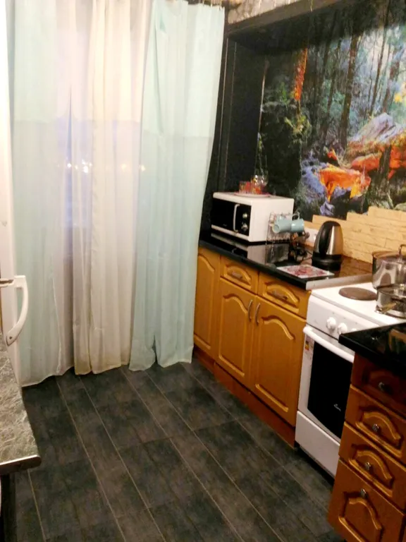 Однокомнатная квартира с балконом и видом на город и залив, 24 часа