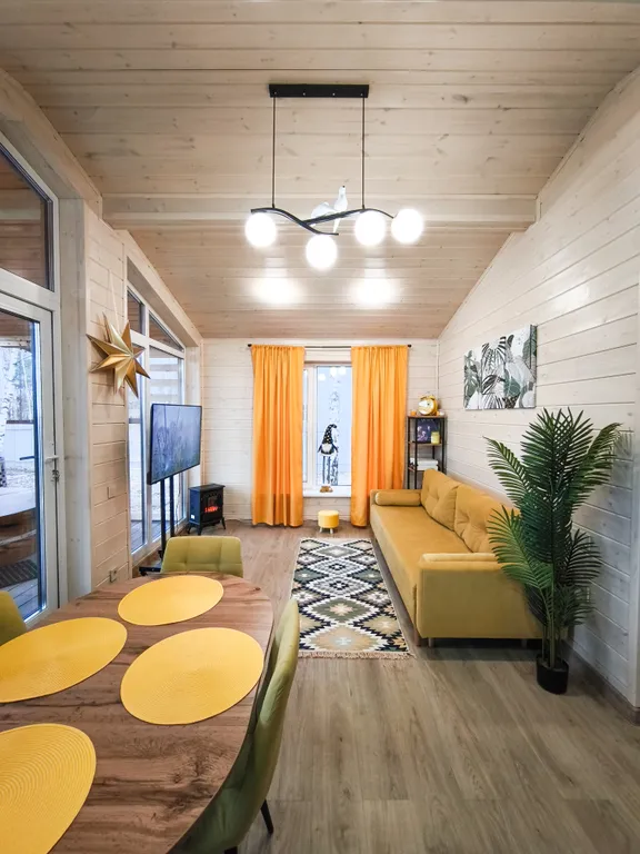 Дом шале с горячей купелью на террасе