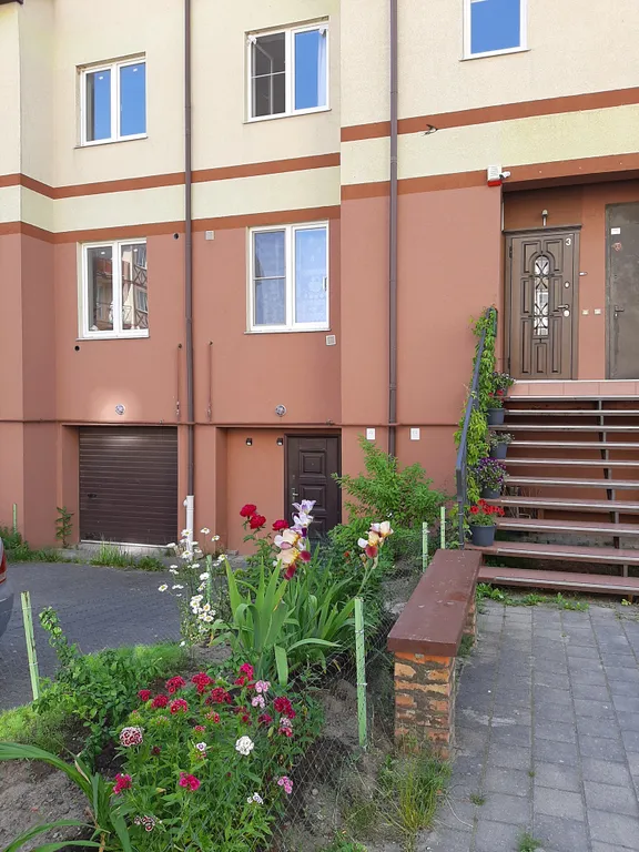 Уютная комната в трёхэтажной квартире в западной части города