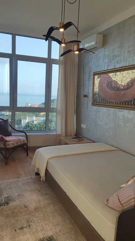 Апартамент Любимое Небо - море и горы - наслаждаться лежа на кровати