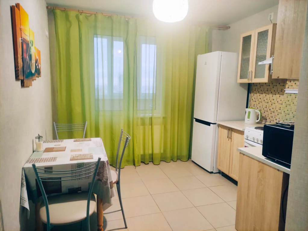 Квартира с видом на город и Волгу