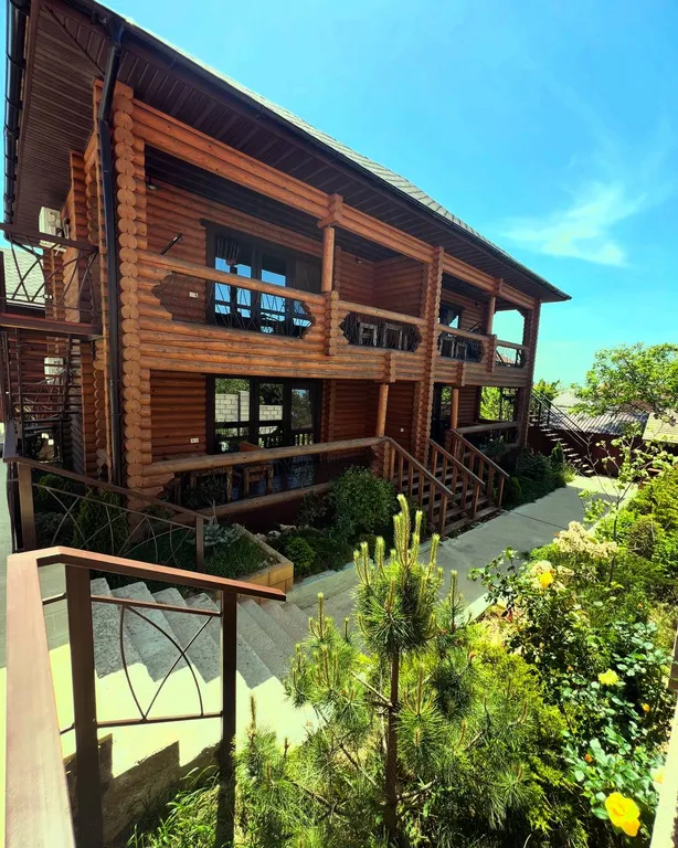 Семейные апартаменты Балдино в доме из сруба