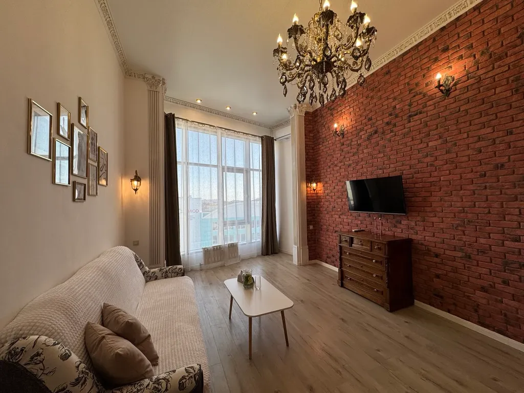 Двухуровневая стильная и комфортабельная квартира