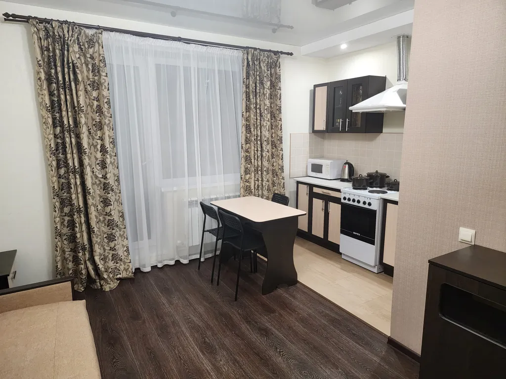 Уютная студия с видом на город рядом с вокзалом