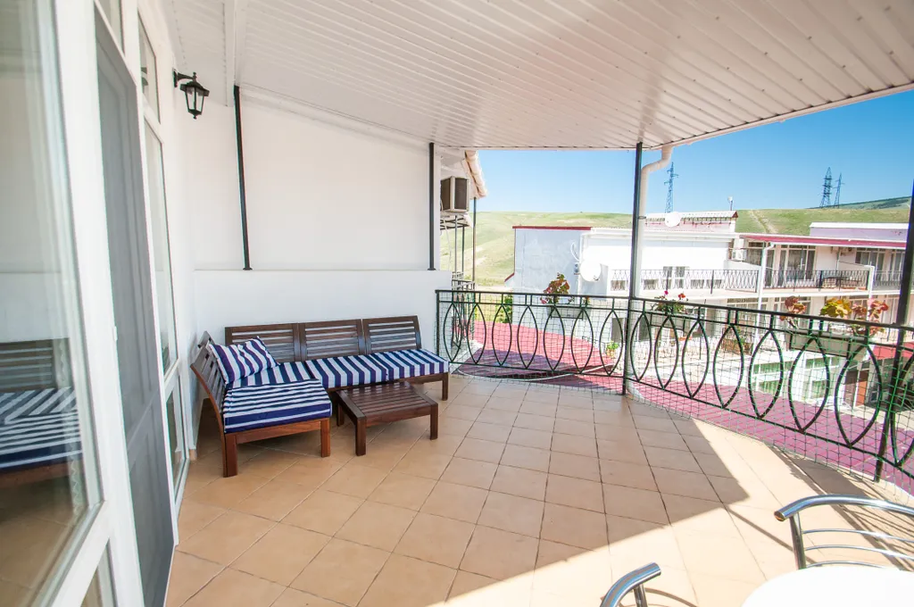 Апартаменты с террасой и боковым видом на море астра 5