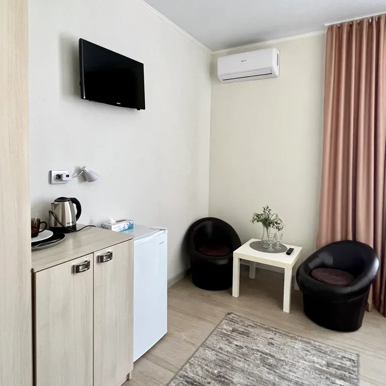 Квартира Квартира Уютный номер с 1 двуспальной или 2 раздельными кроватями — Сириус