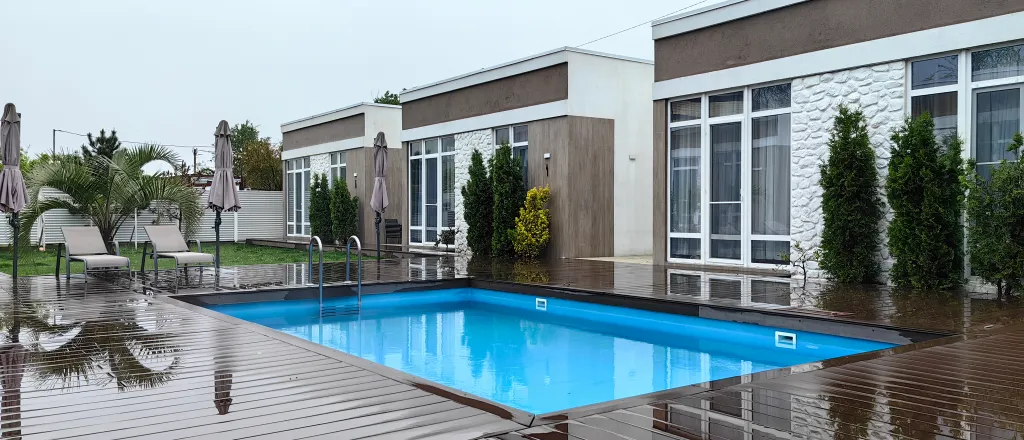 Шикарный коттедж с подогреваемым бассейном, сауной и зоной барбекю