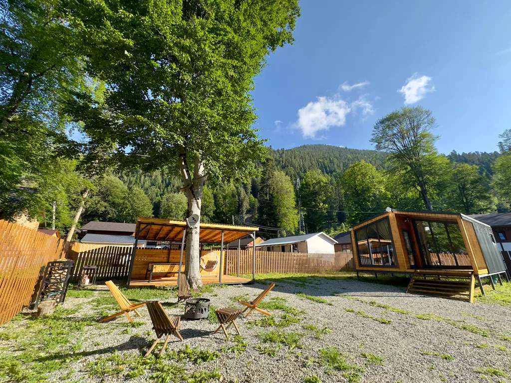 Коттедж Коттедж Уютный барнхаус с большими панорамными окнами — Архыз