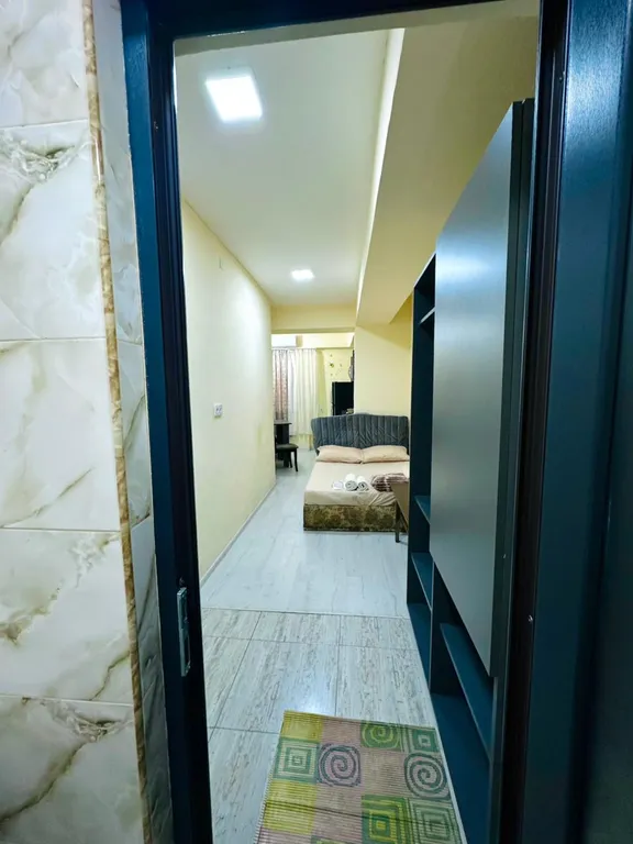 В центре рядом с музеем Сергея Параджанова