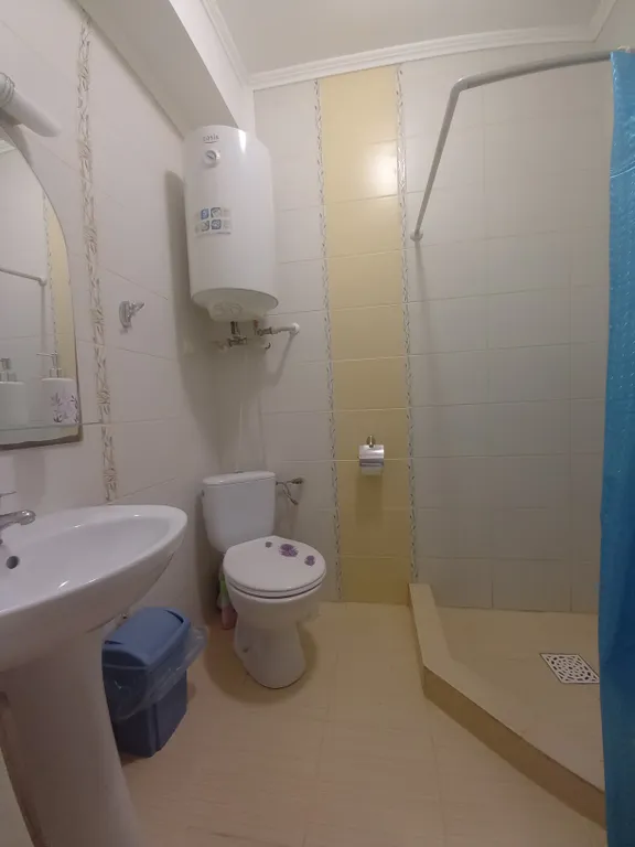 Часть дома с зеленым двориком на Косе у моря