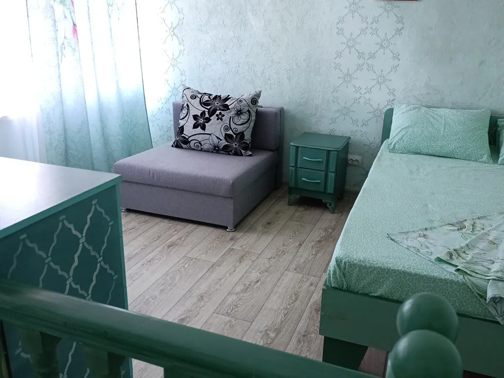 Двухэтажный номер зелёный