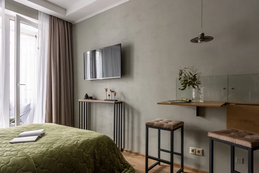 Студия Колосья с качелью на балконе и видом на сосны