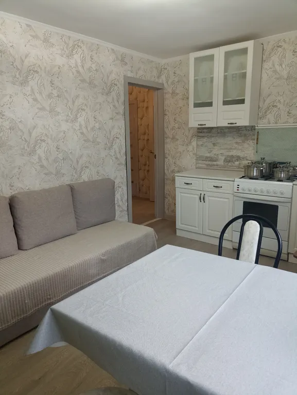 Квартира со своим двориком и стоянкой