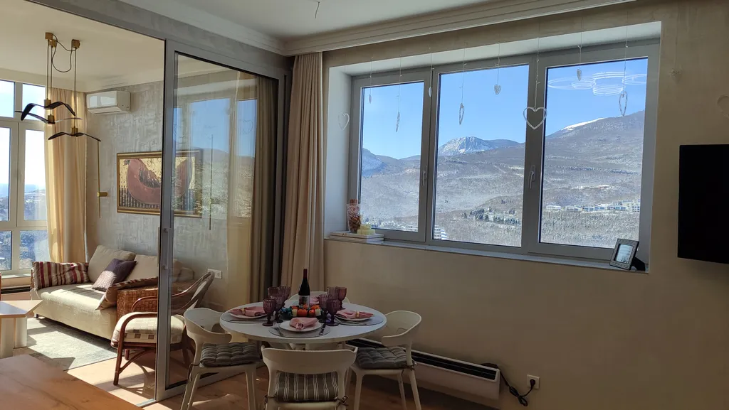 Апартамент Любимое Небо - море и горы - наслаждаться лежа на кровати