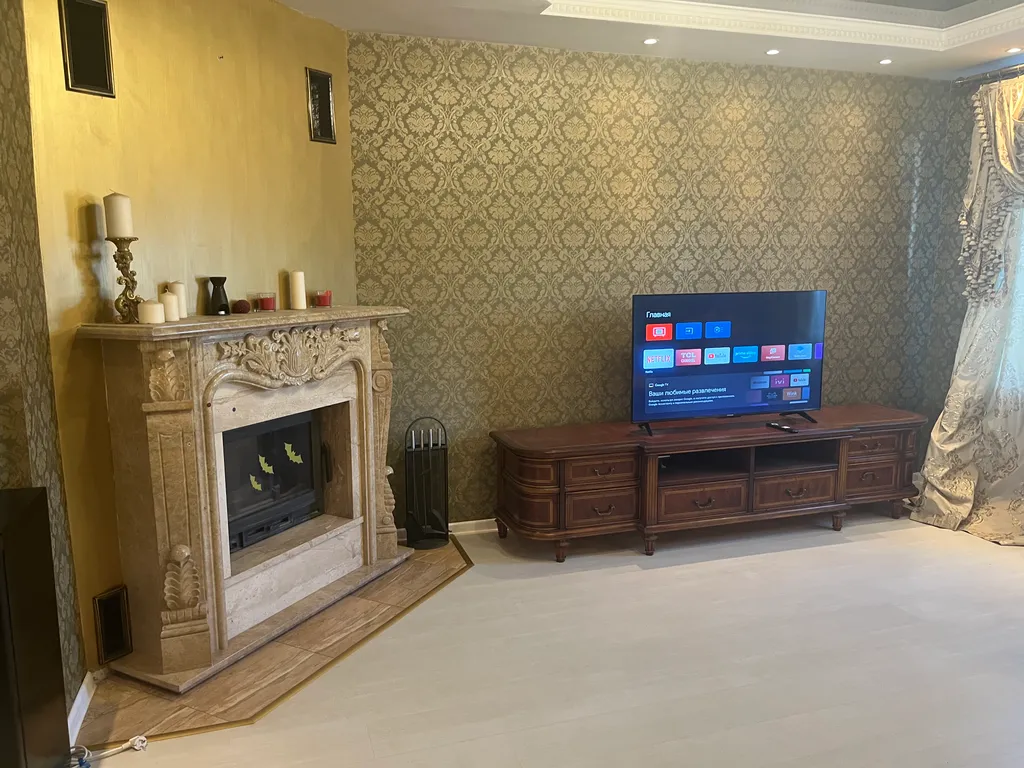 Уютный дом с бассейном, сауной и камином