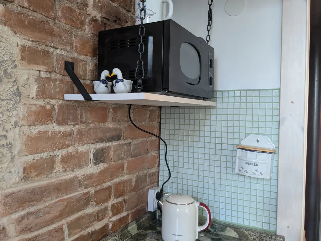 Уютная двухуровневая квартира-студия в доме XIX века