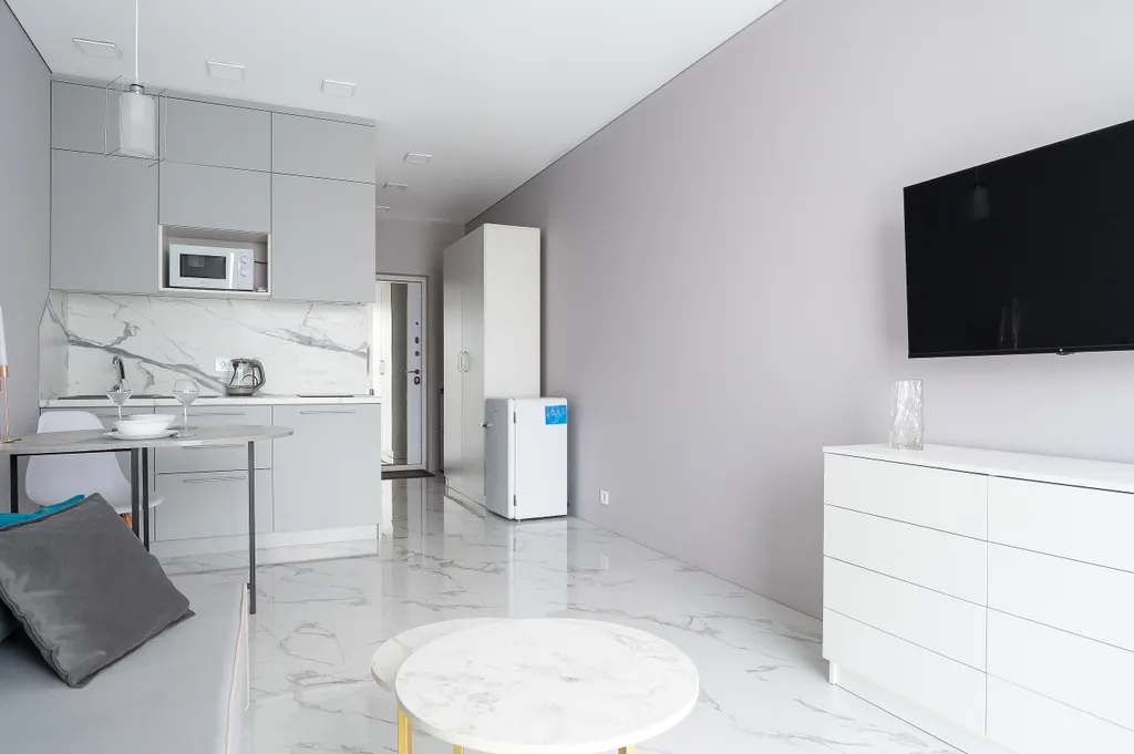 Светлая студия Real Apartments