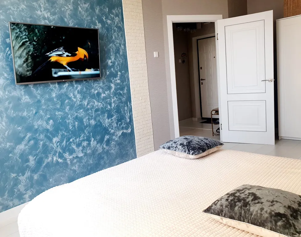 Новая квартира с видом на стадион