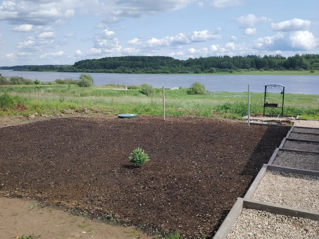 Уютный дом с баней и бассейном на берегу реки Волхов